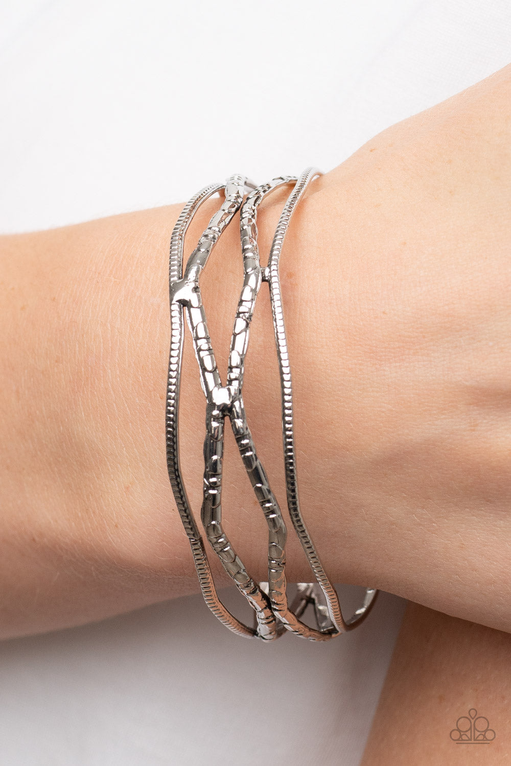 Paparazzi A Narrow ESCAPADE Silver Bangle Bracelet - P9BA-SVXX-136XX