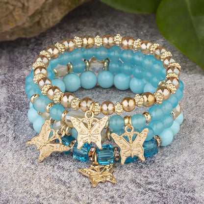 4-Piece Bohemian Butterfly Charm Bracelet Set – Crystal Beads & Stylish Layered Design